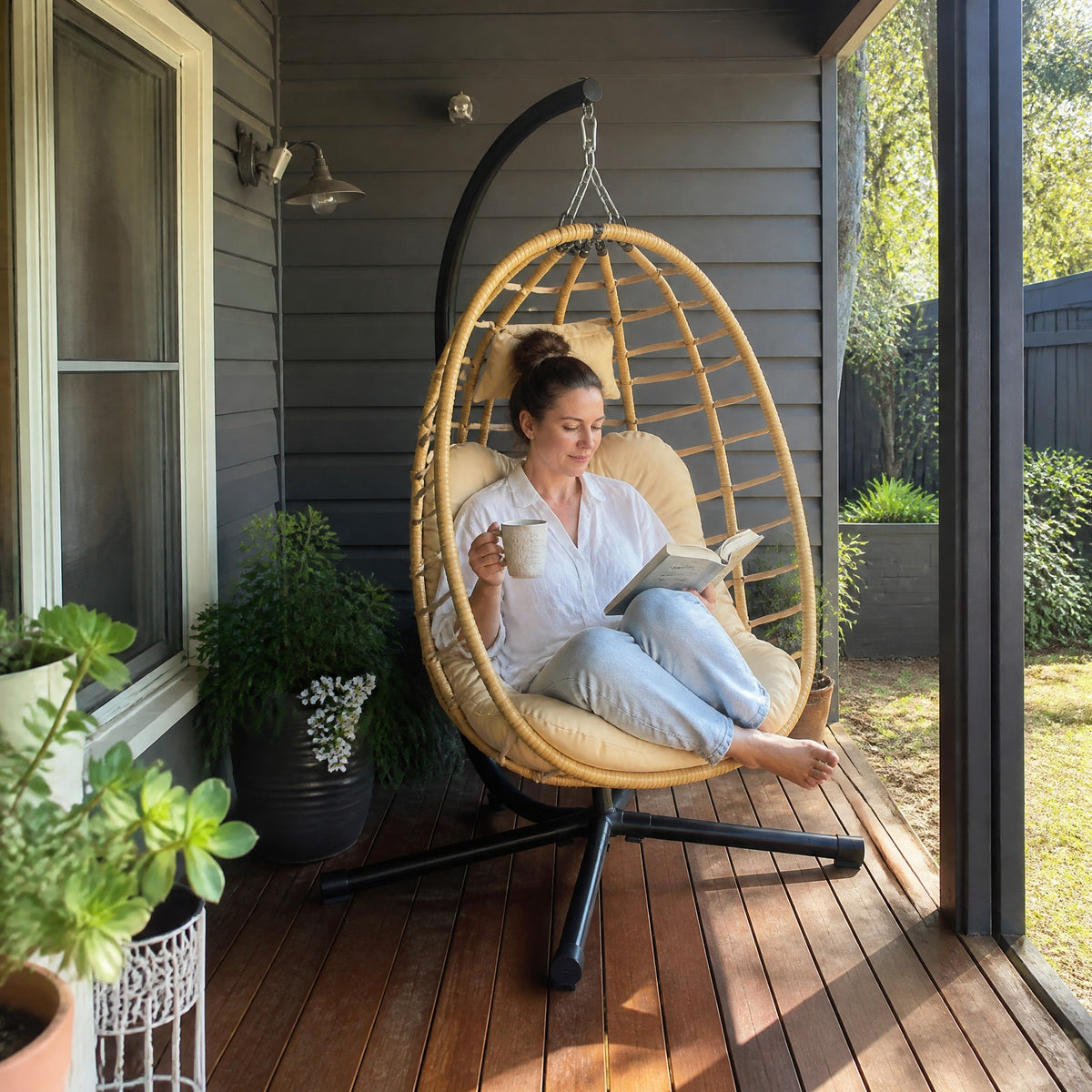 Hanging Egg Chair with Stand, Natural - in use